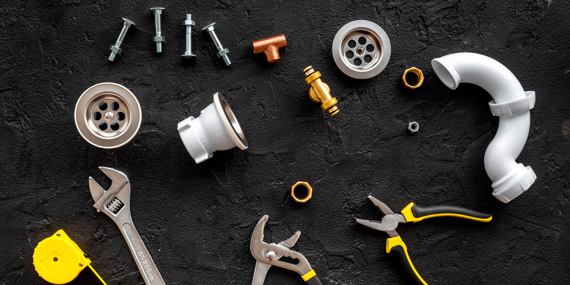 Plumbing and heating professionals at work